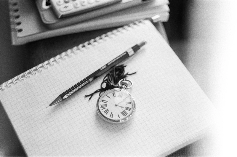 Photograph titled: analog writing down time